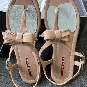 PRADA Bow Sandal - Nude Patent Leather (Size 6)